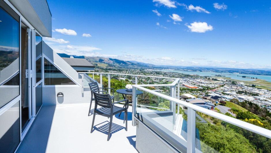 Private upstairs balcony ideal for your morning coffee looking at Tasman Bay