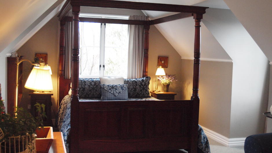The Master Bedroom with four poster bed