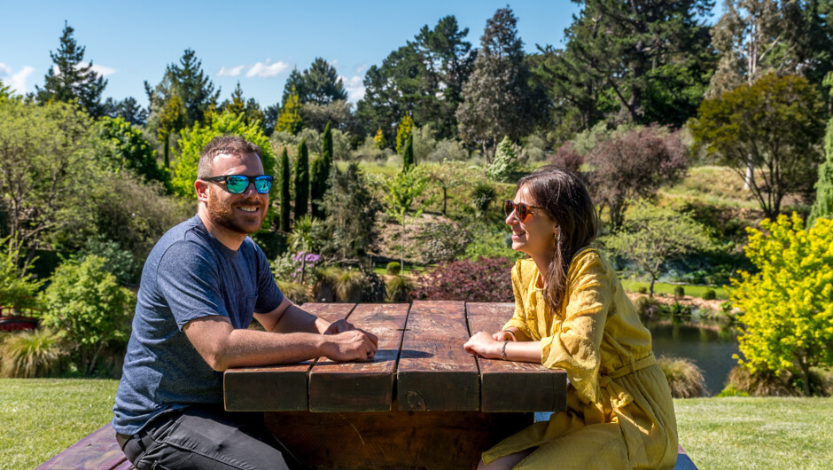Couple enjoying the sun at one of the beautiful Waipara Wineries
