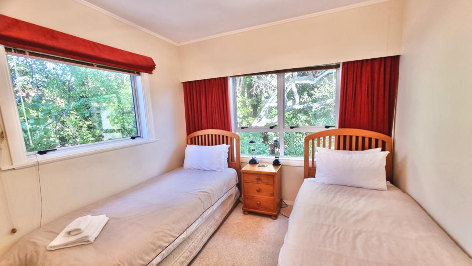 2x Single beds with garden views
