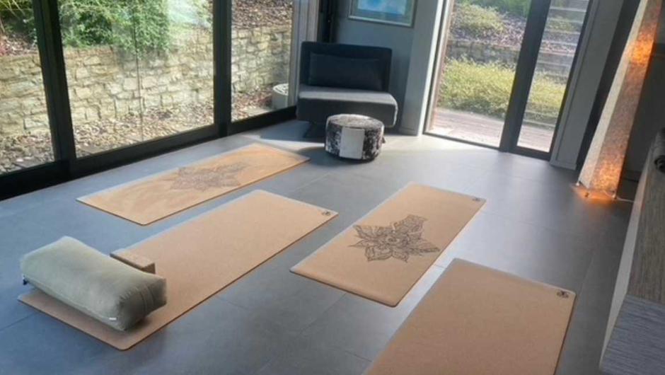 Yoga room with the ability to make up two extra single beds.