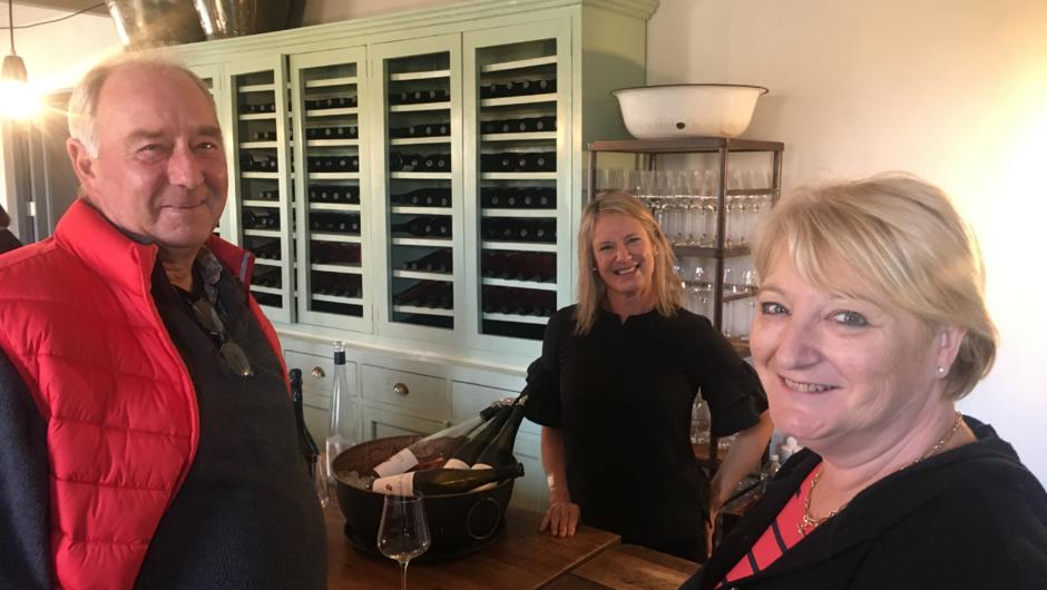 Guests enjoying wine tastings with Winemaker/Owner Poppy Hammond, Poppies Martinborough.