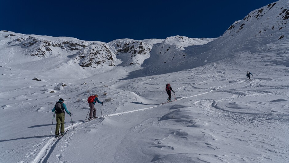 Heading back up to the hut after a ski descent