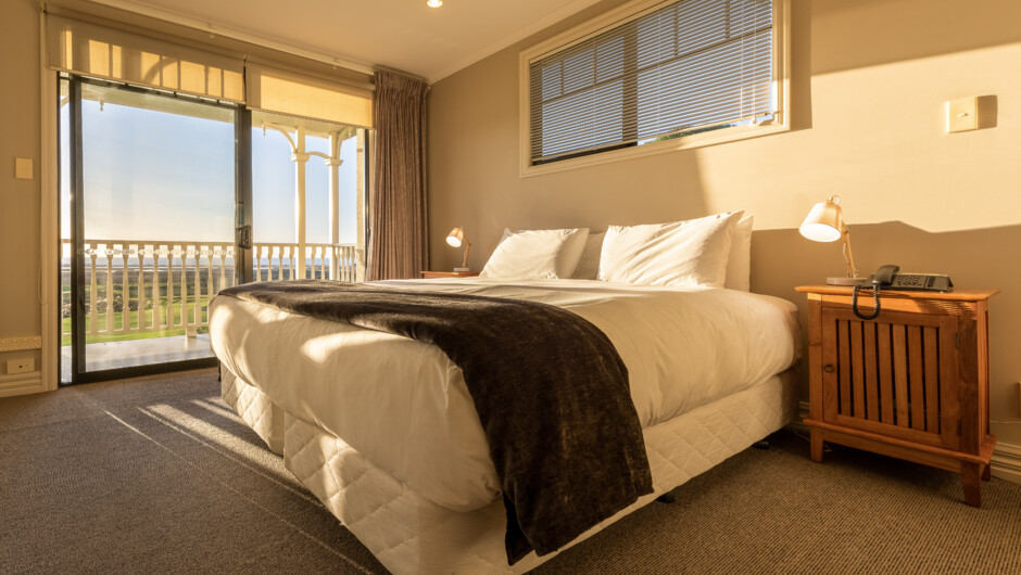 Villa bedroom with golf and sea views