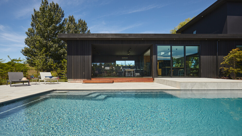 Copper Black pool and outdoor kitchen & lounge
