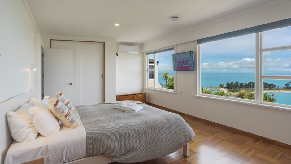 Master bedroom (Upstairs) with Super King bed, Ensuite, TV, Aircon &amp; sea views