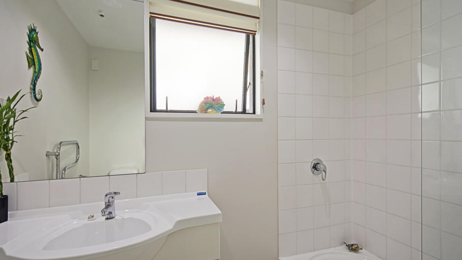 Main Bathroom with Shower over Bath, Toilet &amp; Vanity