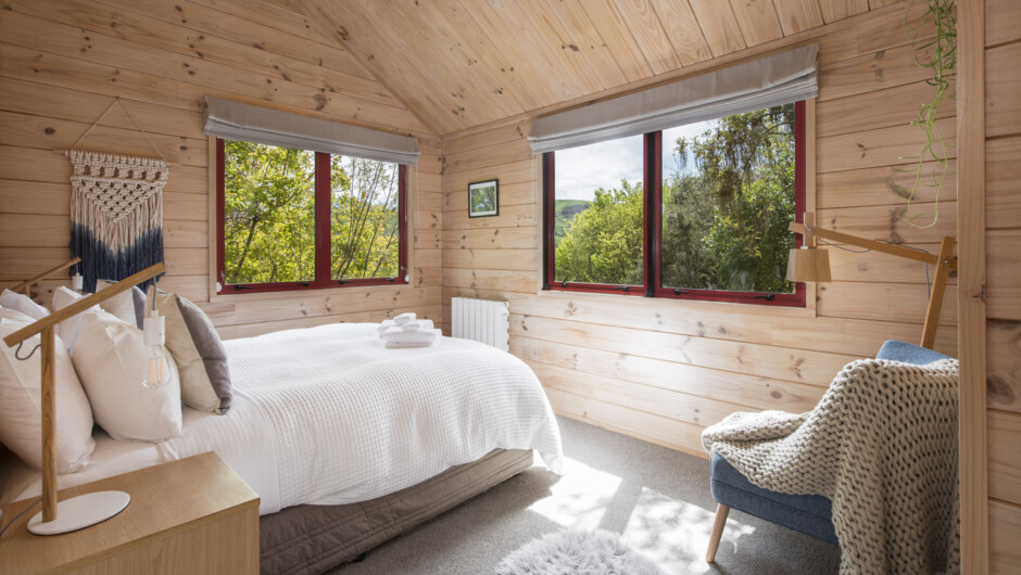 Bedroom 2 with Queen bed & amazing rural views of the country hills beyond