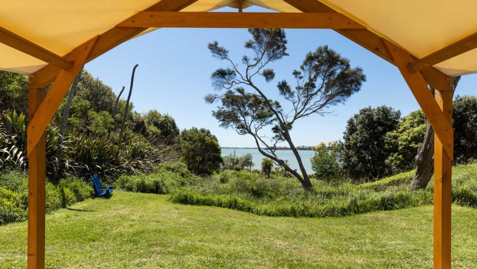 Wainui Seaside Glamping Tent: Starry Nights - breathtaking views of a starry night with Ohope Beach street lights in the distance.