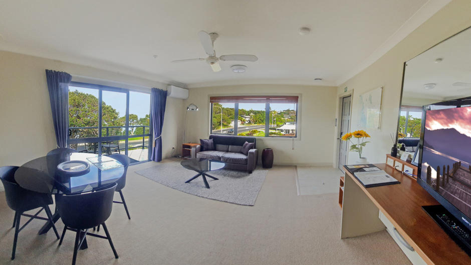 Executive 1 bedroom suite lounge and private terrace with views on the ocean.