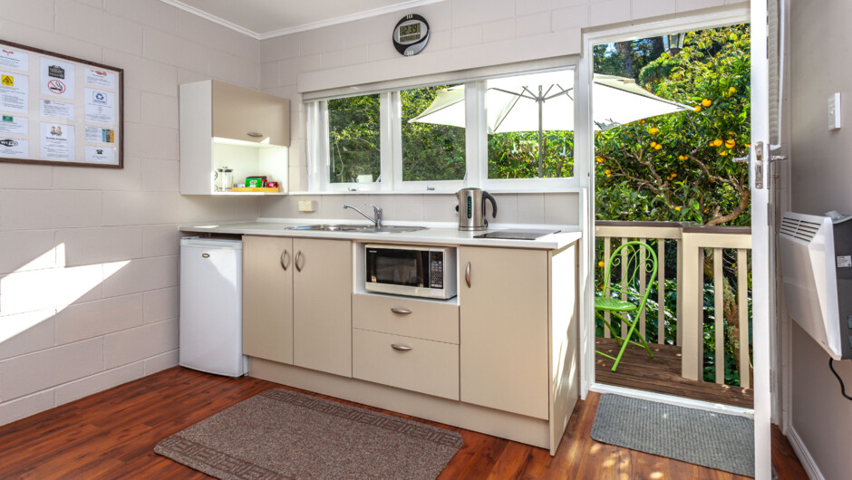 One-bedroom Apartment. Kitchen and outside deck.