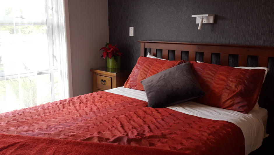 We have 2 rooms with Queen beds - room 2 and %. Both are light and airy with access to the garden. Room 2 has a large wardrobe but both rooms have TV, phone chargers and a vanity.