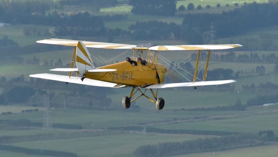 Take to the skies in a de Havilland Tiger Moth scenic flight.