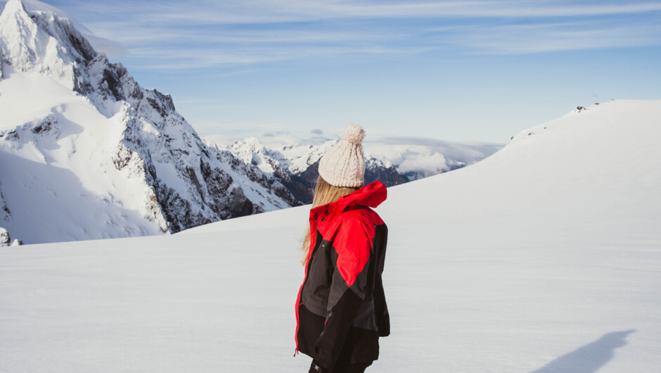 A moment to take in the 360 mountain views while stepping foot on the Tutoko Glacier close to Milford Sound.