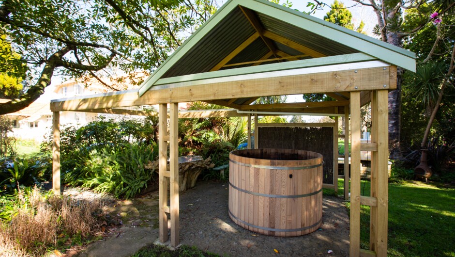 The cedar hot tub with a retractable sliding roof.