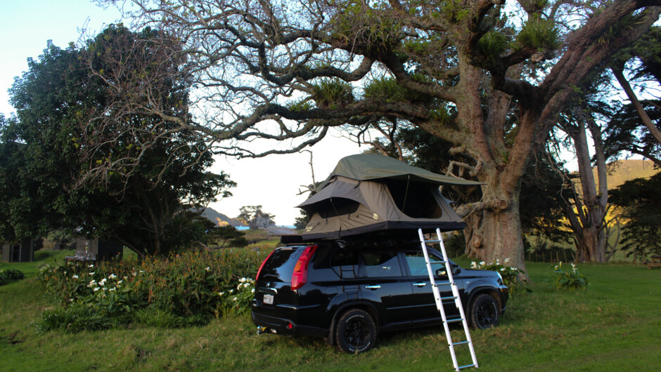 Stay High in your rooftop tent adventure vehicle with all-inclusive camping gear provided.