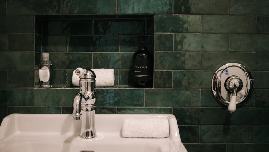 A light and spacious bathroom offers every indulgence, heated floors and Real World Organic products (made locally in Hawke&#039;s Bay). There is also a daily room refresh service to replace towels and linen.