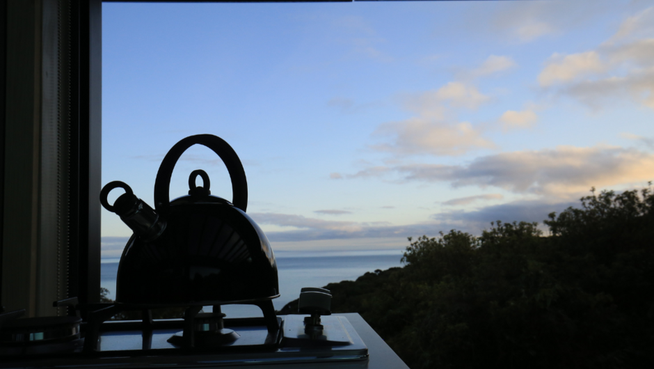 Even making a cup of tea or coffee you can drink in the view of Lee Bay and beyond.