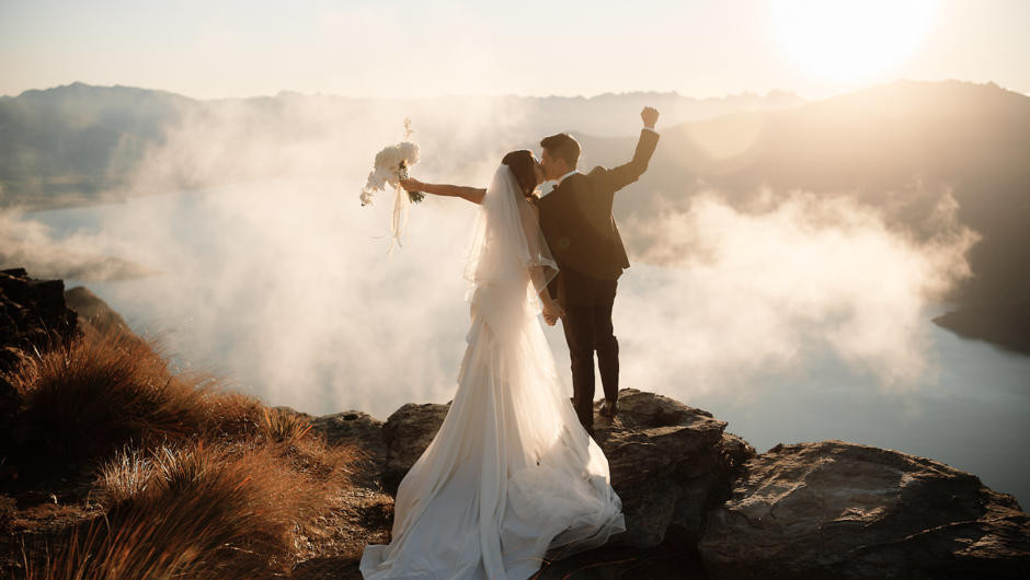 Heli-Wedding above the clouds at The Ledge on Cecil Peak, in Queenstown New Zealand.