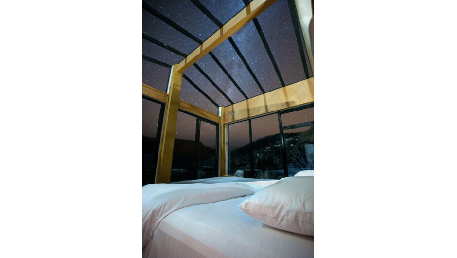 Nga Whetu Piata (The shining star) room: Surrounded by glass walls and ceiling, perfect for  watching the stars and the sunrise over the native bush.