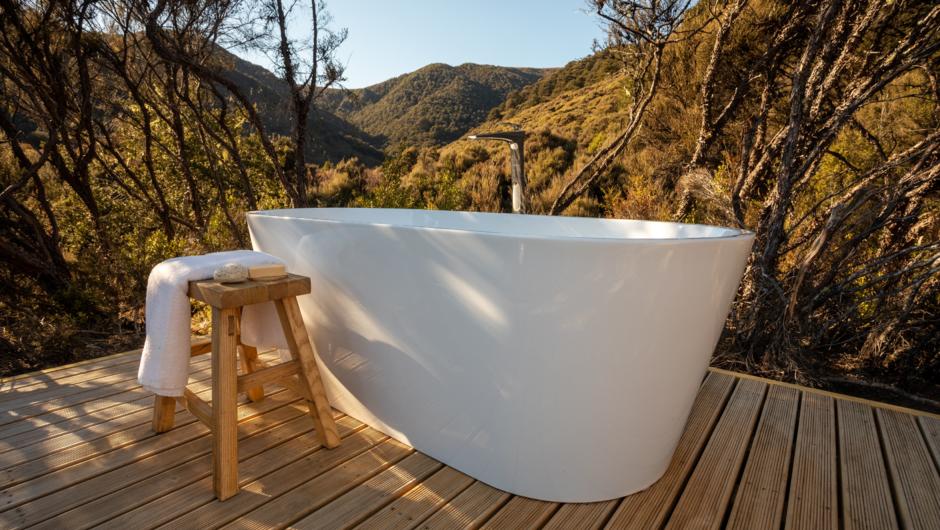Soak your bones in our outdoor bath tub with the views to help unwind.