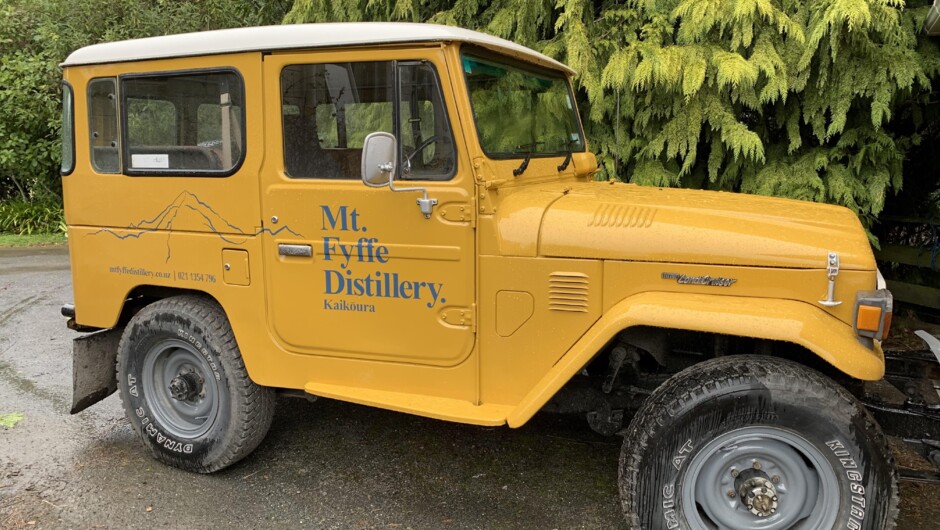 My trusty landy helps deliver gin around town.