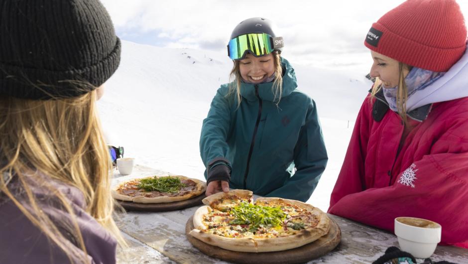 Pizza on top of a mountain.