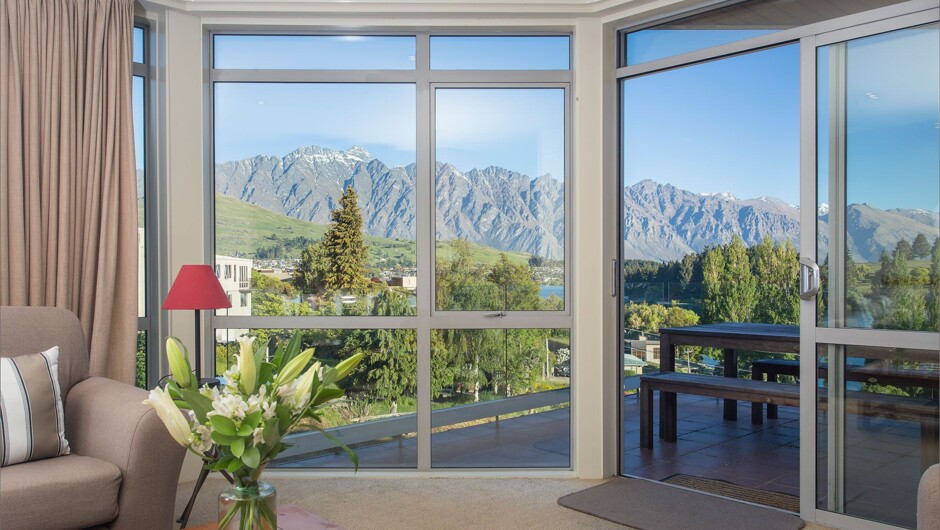 Private balcony access from the lounge with stunning lake views