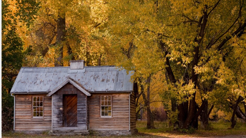 Arrowtown's Police Camp historical cottage in Autumn