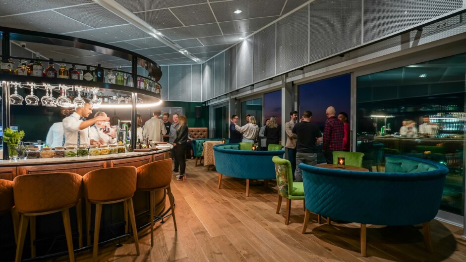 The top floor bar is a destination in itself with a carefully curated drinks menu and floor-to-ceiling windows offering one-of-a-kind views of the city.