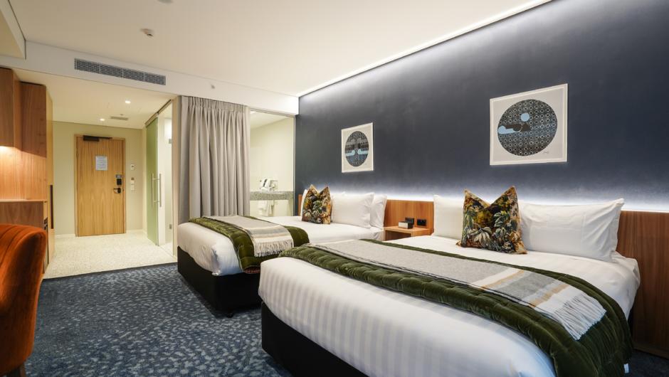 The Superior Room has been designed with your comfort in mind. It has two queen pillow top mattress beds, a beautifully appointed bathroom with a walk-in shower and modern furnishings. The perfect combination for you to relax and unwind.