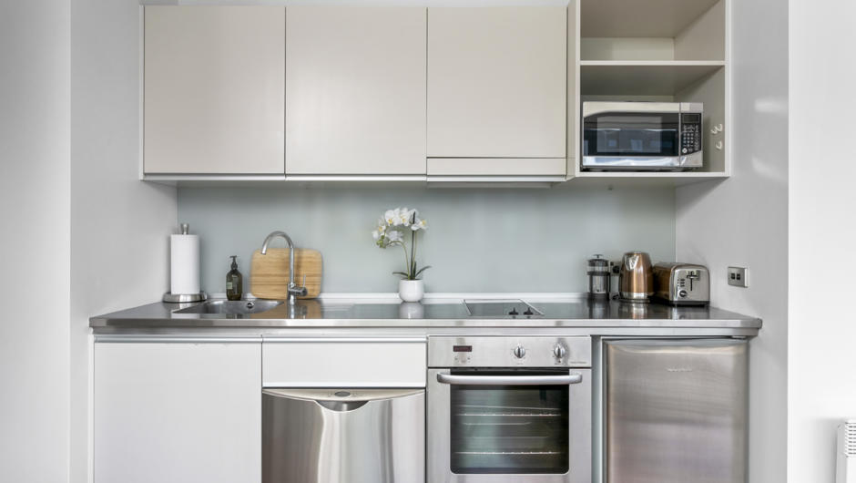 Kitchen comes equipped with cooking basics and modern appliances