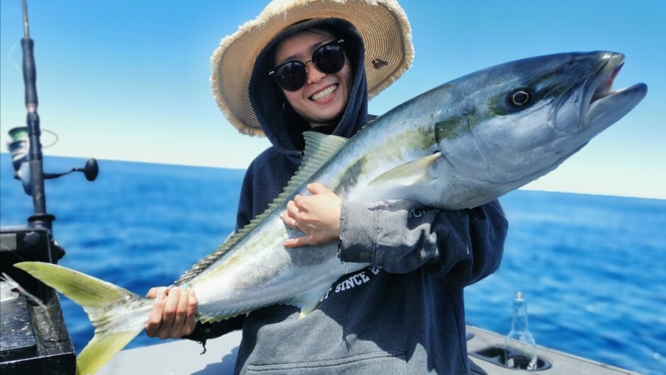 Visitor from Australia catching their first ever Kingfish