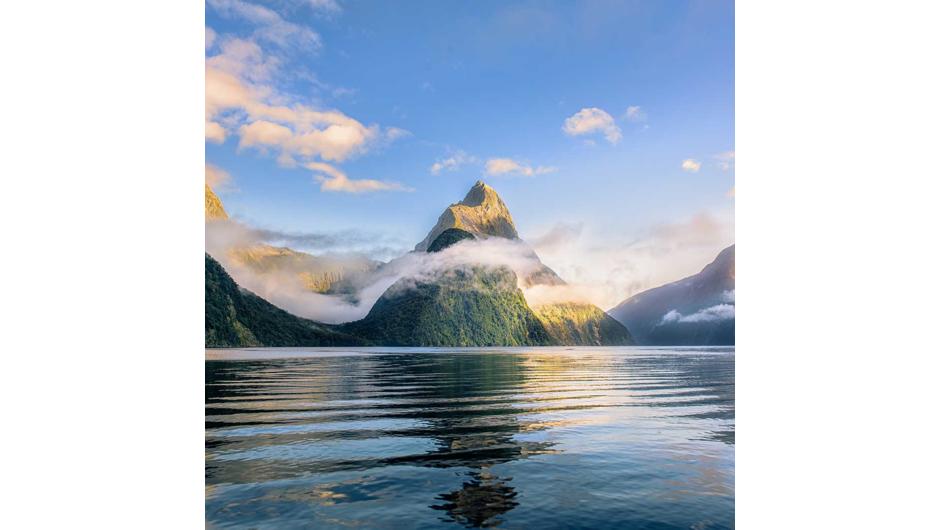 The tour includes luxury coach transport from Queenstown to Milford Sound, with a 1 hour 40 minute Cruise along the full length of the fiord.