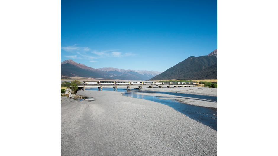 Considered one of the world's greatest train journeys, the TranzAlpine scenic train travels both ways from one coast of New Zealand to the other. From your carriage you'll see the vast windswept Canterbury Plains, spectacular gorges, river valleys and nat