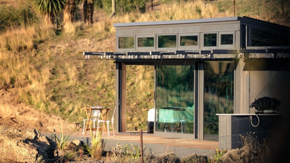 A coffee is waiting for you on the deck at Tāima PurePod.