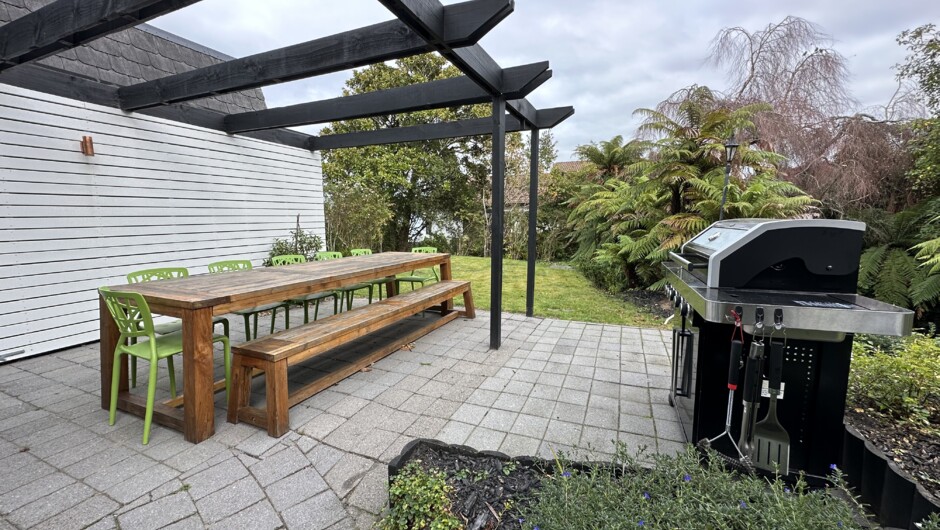 Large outdoor dining and terrace area with BBQ