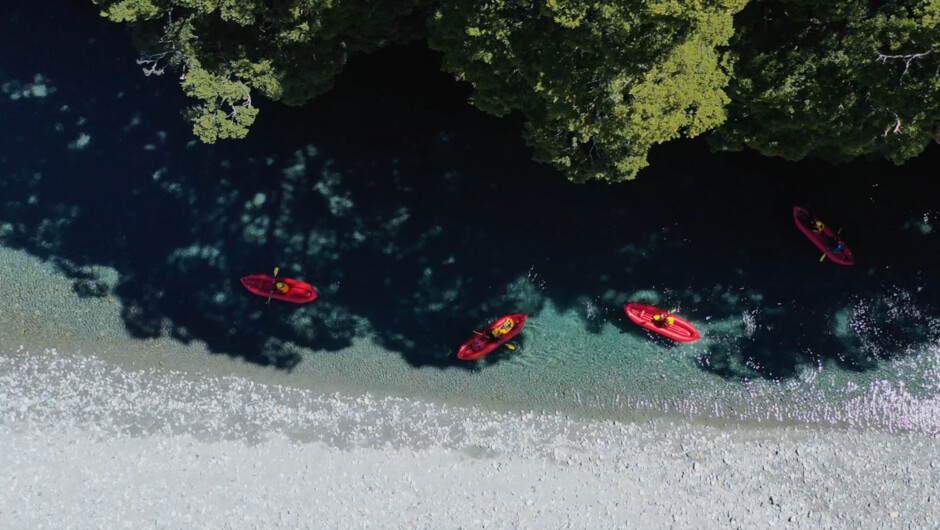 Inflatable kayaking down the Makarora River