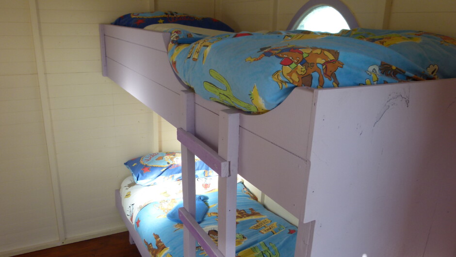 Bunk beds in Wagon Sleepout - Colonial Wagon - Wacky Stays, Kaikoura