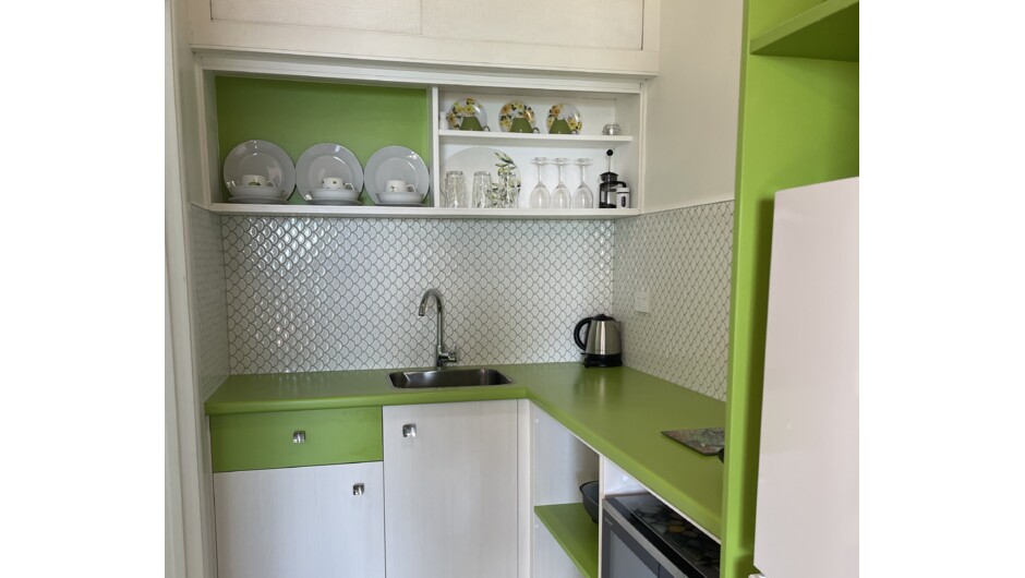 Scallop Studio Kitchenette at Driftwood Beachfront Accommodation with fridge freezer and convection microwave you can self cater at this beautiful beach setting.