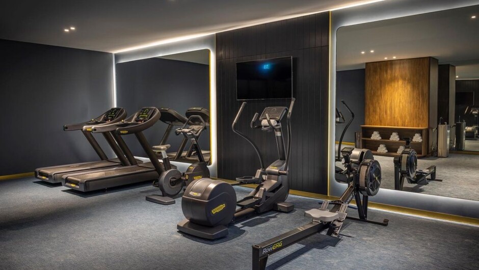 Keep your health and fitness in check with our modern fitness room