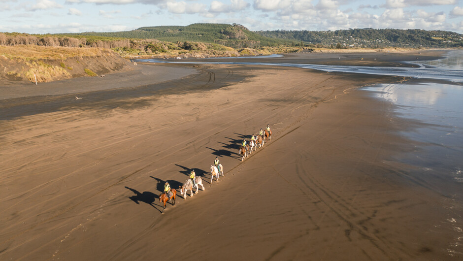 Love long walks along the beach? Here we do it on horseback.