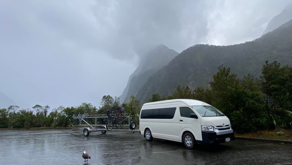 Catch a Bus South assists with the annual Sounds to Sounds cycle challenge. Here is one of our unbranded vehicles waiting for cyclists to arrive in Milford Sound.