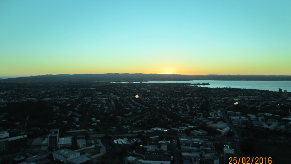 As the Sun sets over the horizon (view from the Sky Tower Observation Deck).