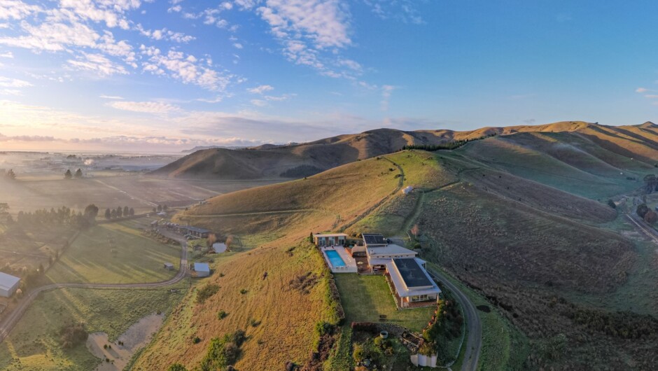 Mountainview Villa Luxury Lodge has a picturesque 360 degrees view as seen from this aerial photo.