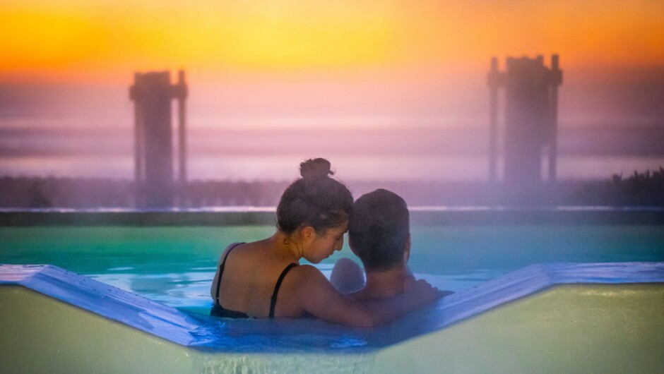 A couple relaxing in the hot pools.