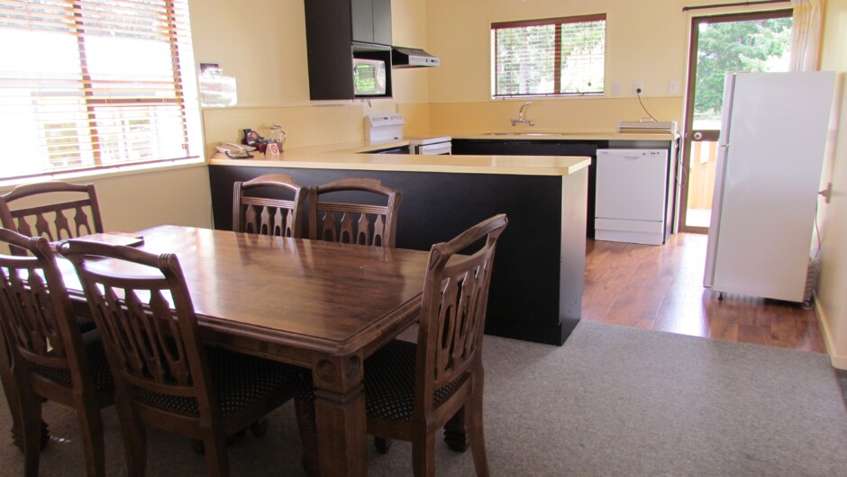 The Large full Kitchen in the Three Bedroom Apartment at ASURE Amber Court Motel, Te Anau.