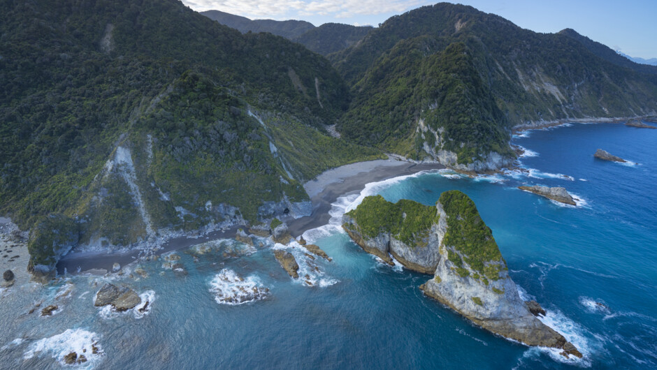 The rugged yet beautiful west coast of New Zealand, can be viewed on your flight to and from Milford Sound.