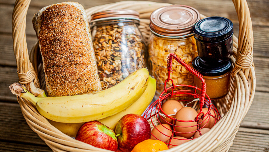 Continental breakfast basket with housemade sourdough bread, free range eggs, muesli and seasonal fruit and preserves