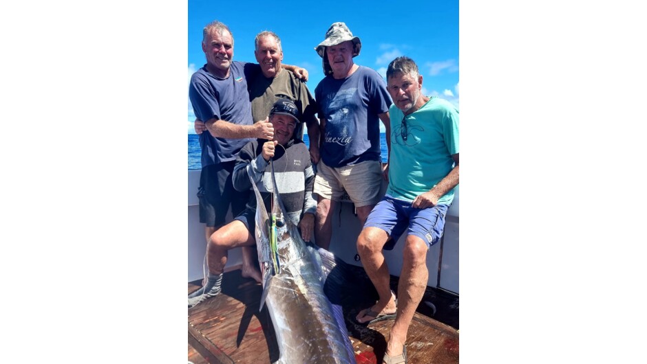 Jeff and his team ticking off their bucket list fish.